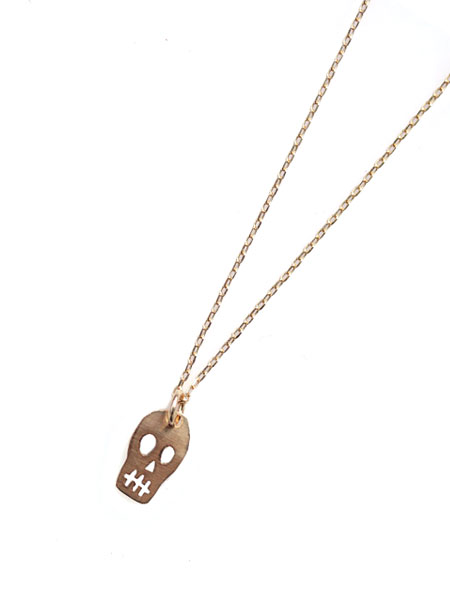 ON THE SUNNY SIDE OF THE STREET 10K Tiny Skull Necklace